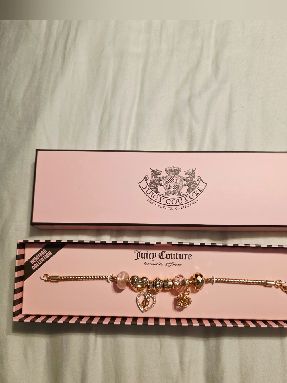 Juicy Couture Heritage Collection Gold Charm Bracelet with Pink Accents